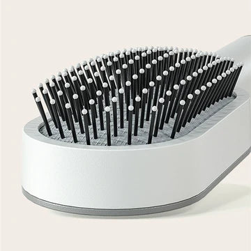 Self-Cleaning Scalp Brush