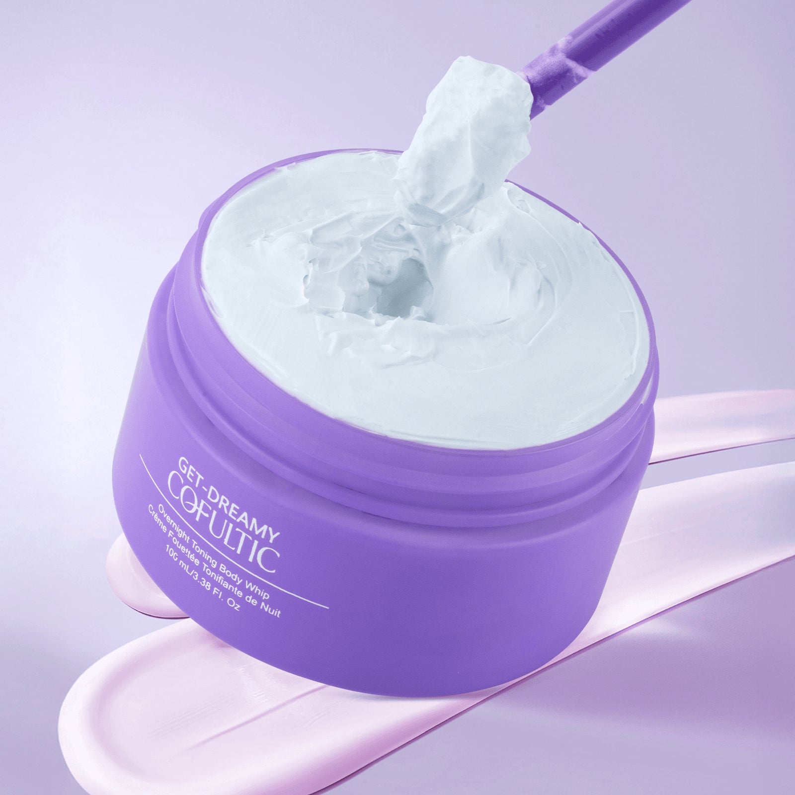 Purple jar of cosmetic product with a purple spatula on a light purple background